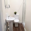Photo 6: Humidity tracking fan, heated towel rail and spacious walk in shower