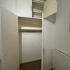 Photo 4: Large Wardrobe & storage above 