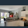 Photo 2: Kitchen/living area