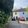Photo 3: Front of house and driveway