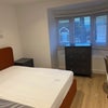 Photo 2: comfortable, large bed with storage. 