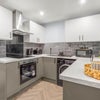 Photo 2: Kitchen Area