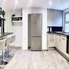 Photo 2: Fully equipped kitchen, fridge, washing machine, oven.