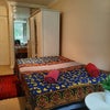 Photo 4: tall mirror and storage