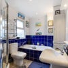 Photo 2: Upstairs bathroom