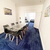 Photo 3: Dining room seats 6-8 comfortably in padded chairs