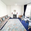 Photo 8: Drawing room with oblique sea views, seats 9-12