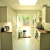 Photo 5: Modern Kitchen opens to garden