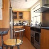 Photo 8: Fully-equipped kitchen.