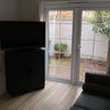 Photo 7: Living Room with TV
