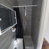 Photo 3: Toilet and shower 