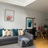 Photo 2: Living room and adjoining kitchen