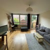 Photo 2: South facing window and patio door leading to garden