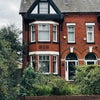 Photo 15: The house from the street view
