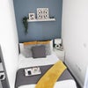 Photo 8: The bed is a storage bed so lots of additional space underneath