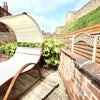Photo 4: Sun trap garden in castle moat 