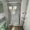 Photo 4: shower and 2 toilets shared with 2 others