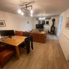 Photo 7: Living Room with Log Burner and TV