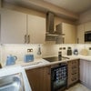 Photo 7: COMMUNAL KITCHEN