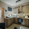 Photo 6: COMMUNAL KITCHEN