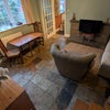 Photo 5: Living room with dining table and TV
