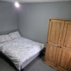 Photo 2: Double bed with fresh bedding, wardrobe included – clean, quiet, and fully furnished