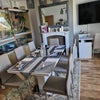 Photo 6: Dinning room and large smart Tv