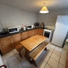 Photo 2: Downstairs kitchen
