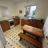 Photo 6: Upstairs kitchen