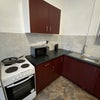 Photo 9: Private allocated kitchen area on ground floor with separate cooker, own sink, own fridge / units / 