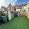 Photo 4: Astro turf garden, will jazz up with festoon lights, plants  seating & bbq