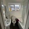 Photo 8: Bathroom is small but has everything you need inclysive of bath & shower