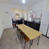 Photo 9: Shared Dining Area/Smart TV