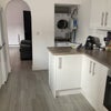 Photo 3: Kitchen and Laundry area