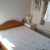 Photo 4: Bedroom with double bed and fitted double wardrobes