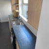Photo 9: Washing machine in kitchen