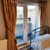 Photo 2: Room 1 (double en suite) - Double bed, French doors to balcony
