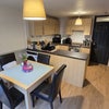 Photo 3: Kitchen: Fully-equipped open-plan kitchen with fridge, large fridge-freezer, washing machine, brand 