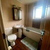 Photo 5: Shared bathroom with electric shower over the bath