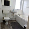 Photo 5: Shared bathroom. With electric shower and glass screen.