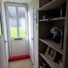 Photo 6: Hallway with downstairs toilet