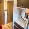 Photo 16: Bedroom 3 with projector, double bed, double wardrobe, desk, chest of drawers