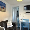 Photo 9: TV room and dining room