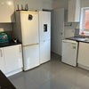 Photo 7: Kitchen - 3 fridges- 2 washing machines.