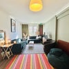 Photo 4: Large lounge with dining area! Very rare