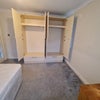 Photo 6: Fitted wardrobe / Hanging rails and shelves