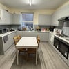 Photo 5: Recently updated kitchen with 2 ovens & hobs, 3 fridge freezers (either side of the camera), 2microw