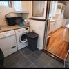 Photo 5: Utility room washing machine and tumble dryer 
