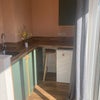 Photo 2: Kitchen, with fridge icebox hob microwave and air fryer 