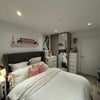 Photo 2: Bedroom in question. Decoration, shelves, chair and tv not included